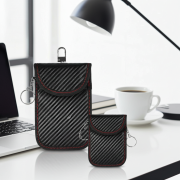 Compact RFID key pouch with secure zip and keychain