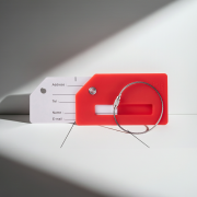 Colourful travel luggage tags with secure metal cable loop