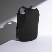 Protective vest showing adjustable Velcro straps and breathable outer cover.”